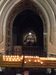 The candle for the St Clare's schoolchildren is in the middle bottom row. St Clare's crypt in the background