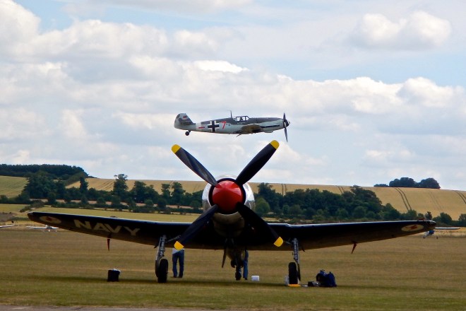 Sleek looking Messerschmitt Bf109 passing over a Hawker Fury FB11