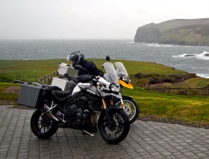 The Calf Of Man- Dave hanging on the the Triumph in strong winds 