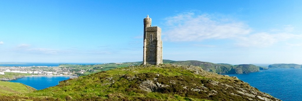 The "Nobby" Milner Tower Bradda Head with Port Erin on the left and The Calf of Man on the right. Footnote- The Tower was nicknamed "Nobby" because it's not as tall as some...