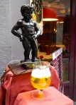 Mannekin Pis outside a restaurant 